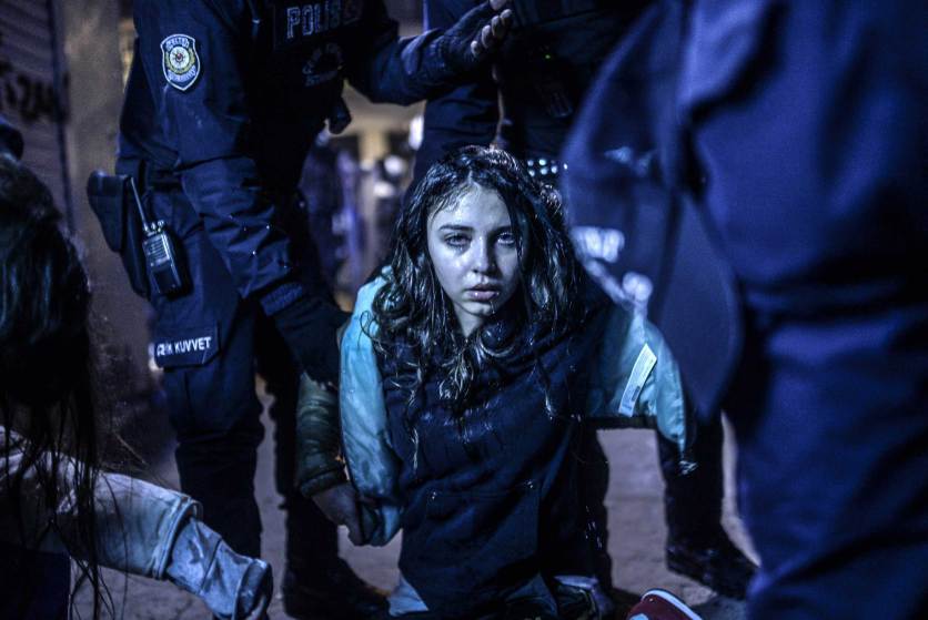A young girl is pictured after she was  wounded during clashes between riot-police and prostestors after the funeral of Berkin Elvan, the 15-year-old boy who died from injuries suffered during last year's anti-government protests, in Istanbul on March 12, 2014. Riot police fired tear gas and water cannon at protestors in the capital Ankara, while in Istbanbul, crowds shouting anti-government slogans lit a huge fire as they made their way to a cemetery for the burial of Berkin Elvan. AFP PHOTO/BULENT KILICBULENT KILIC/AFP/Getty Images