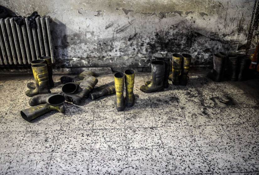 Boats of miners are pictured in an outside building after searching for hours hundreds of co-workers who remain trapped underground on May 14, 2014 after an explosion and fire in their coal mine in the western Turkish province of Manisa killed at least 201 people. AFP PHOTO/BULENT KILICBULENT KILIC/AFP/Getty Images