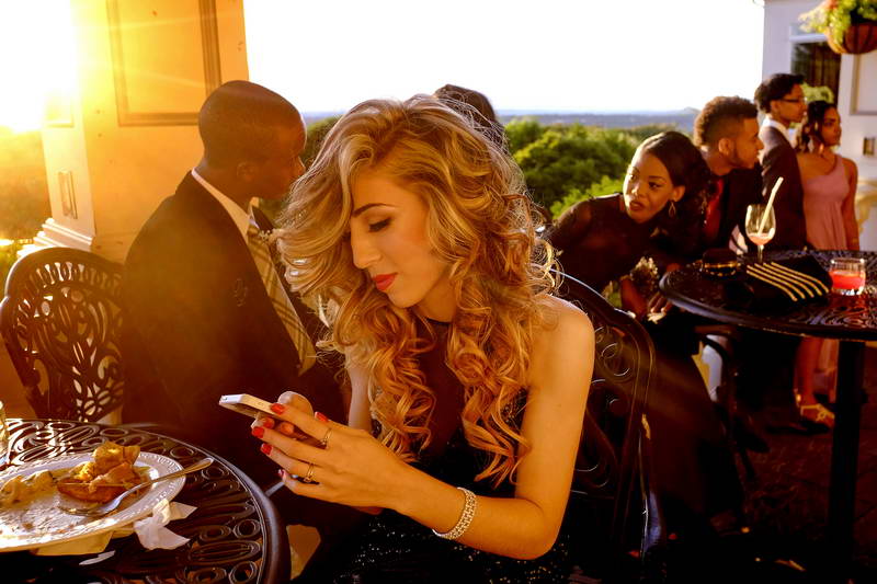 A girl tweets during her prom. For many teenagers, social media has become integral important outlets of who they are.