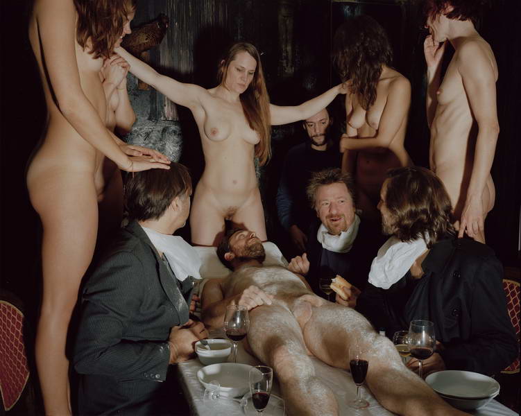 Vadim, a painter who uses live models, creates a work inspired by an existing painting in his studio in Molenbeek.