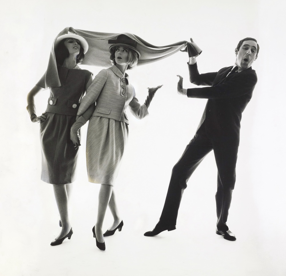 BERT STERN, Actor and director Anthony Newley playing with two models, 1963, Vogue © Condé Nast