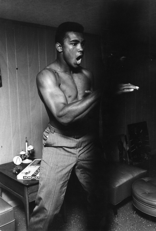 Muhammad Ali (Cassius Clay) Shadowboxing with Monopoly, Louisville, Kentuky, 1963. © Steve Schapiro, courtesy of FaheyKlein Gallery,- Los Angeles